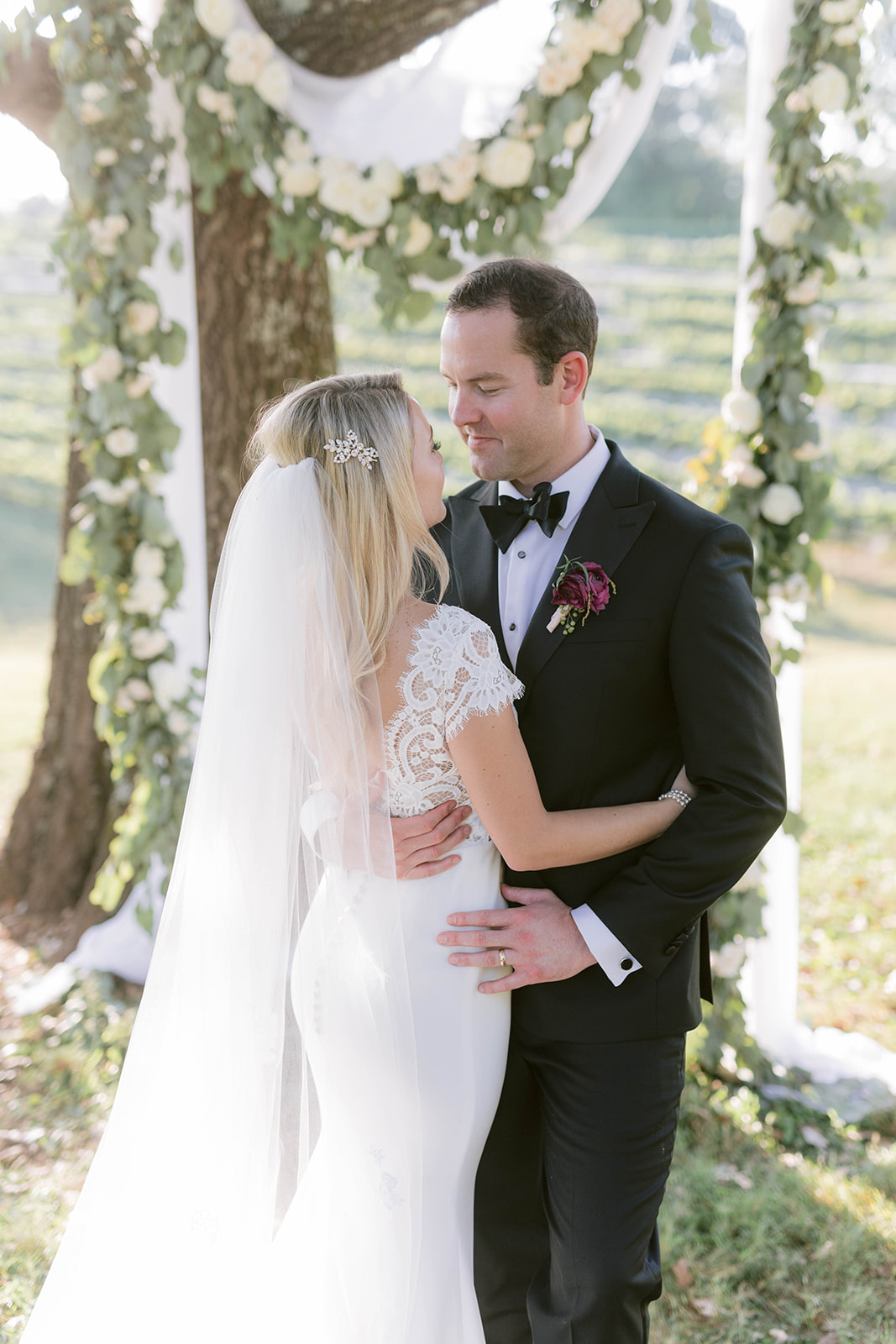 Bride and groom embrace during their portrait session at the Montaluce Winery wedding