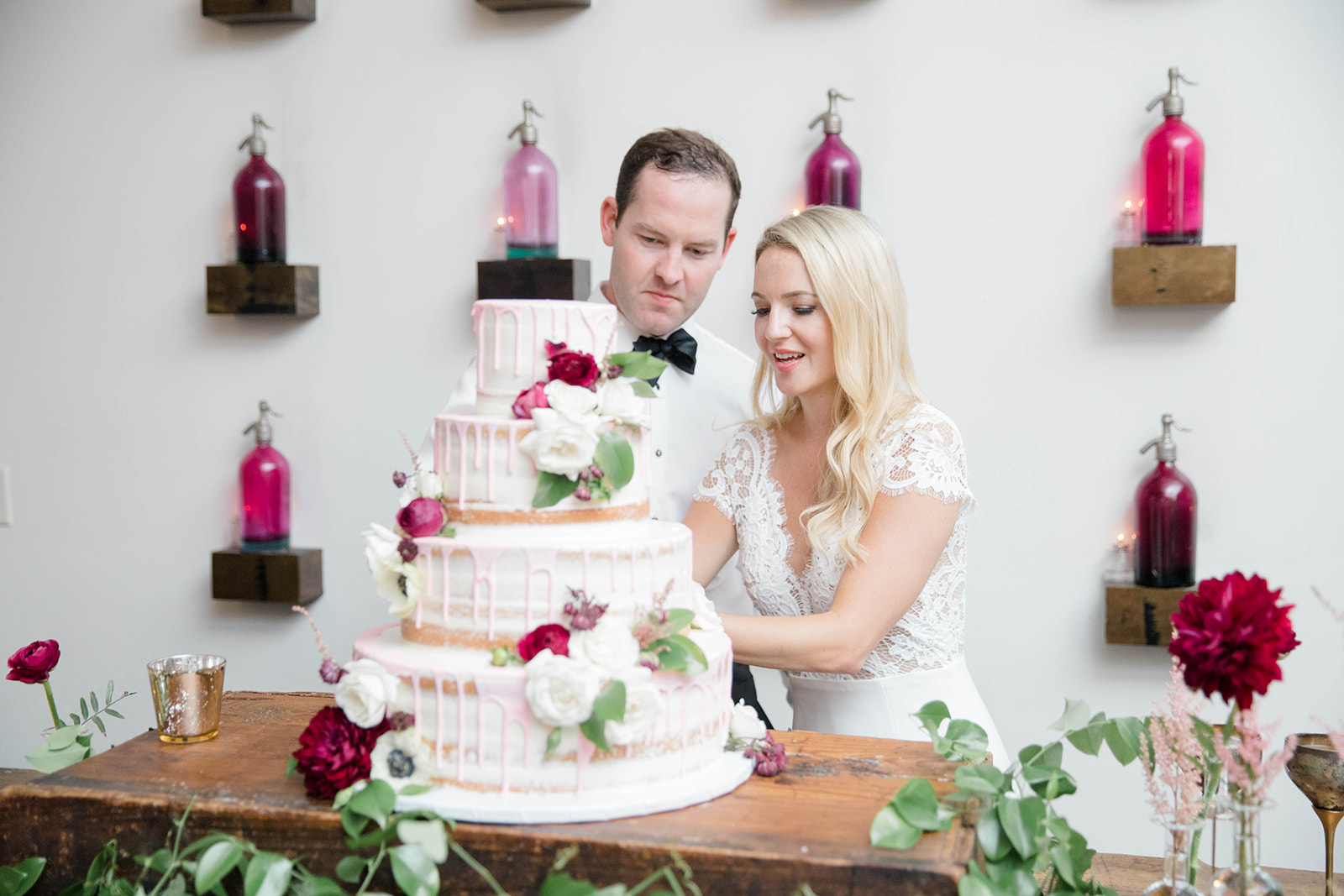 Bride and groom cut the cake at their Montaluce Winery Wedding 