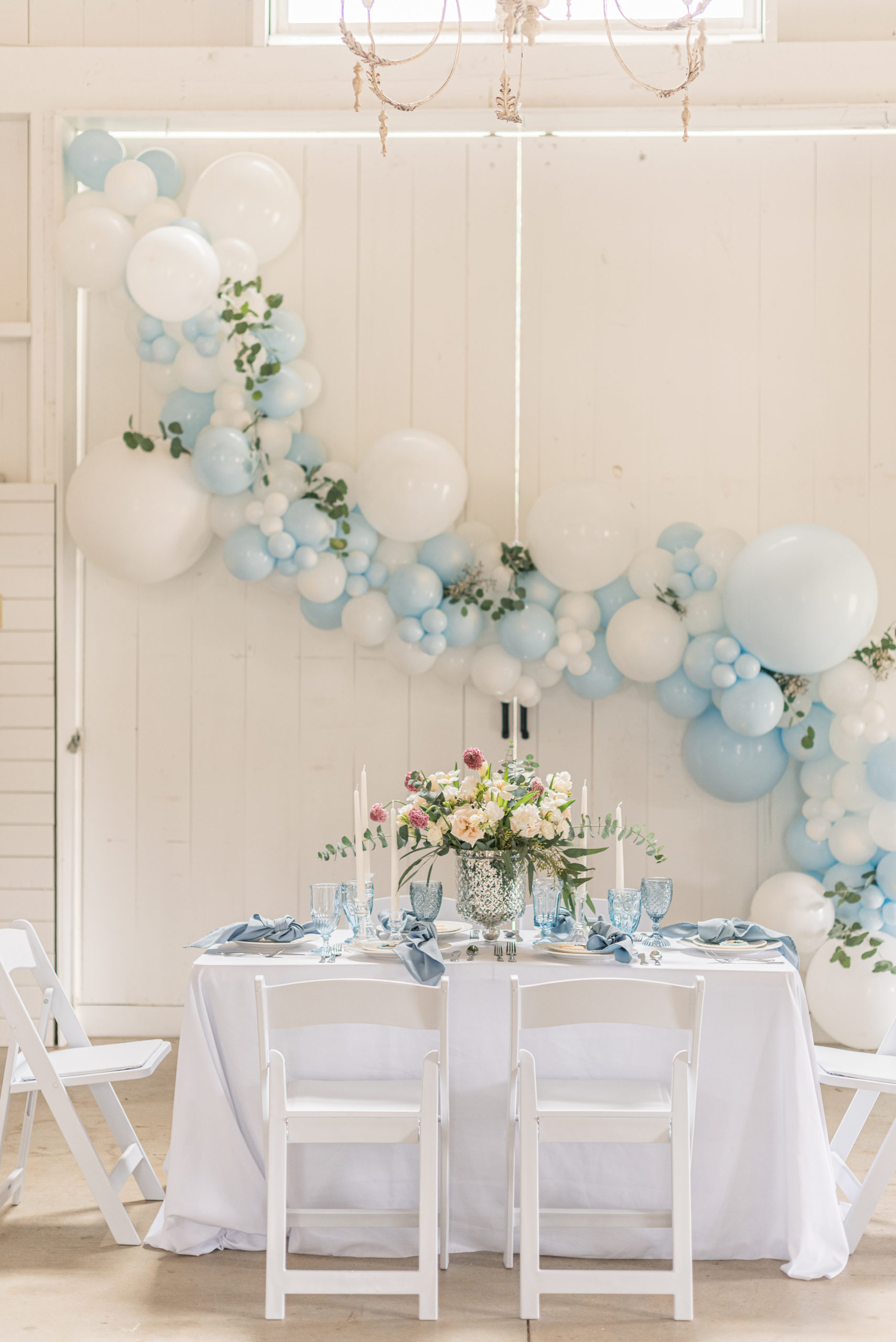 Horse birthday party - garland balloons in white and light blue adorn with silver dollar eucalyptus