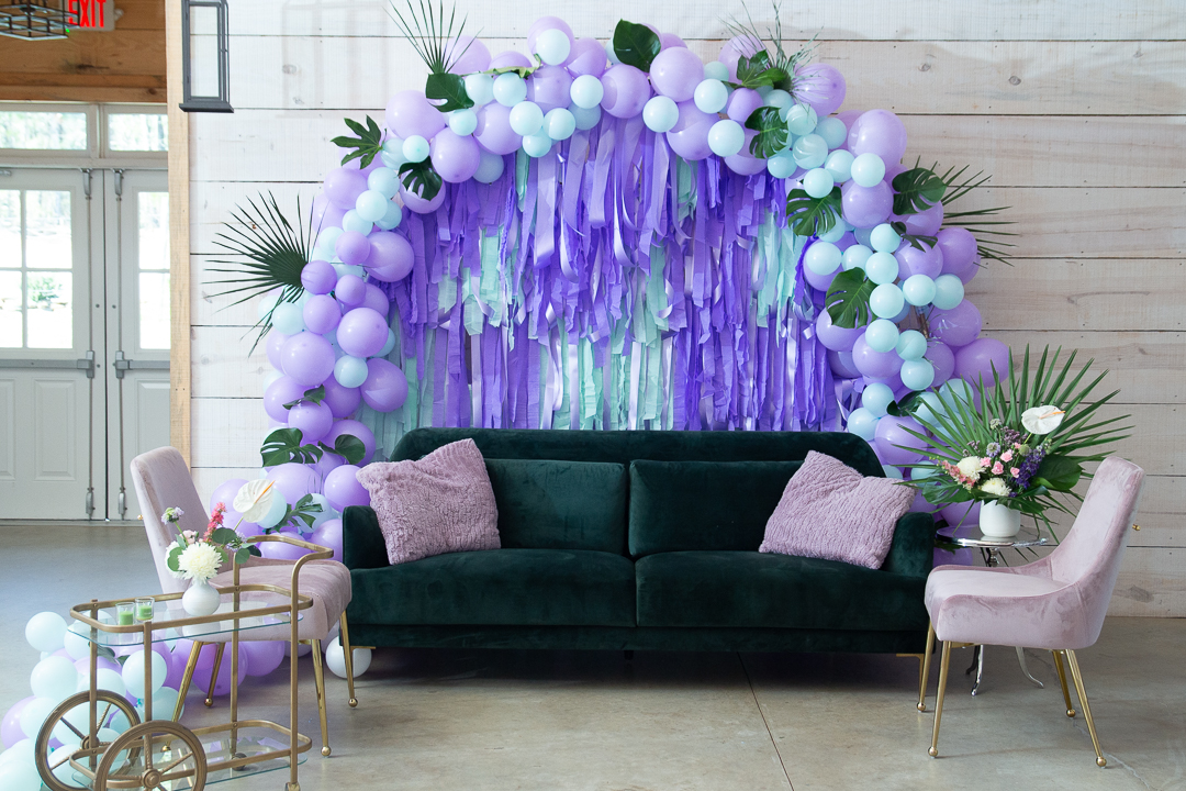 Lounge are at Koury farms with mint and lavender accents and tropical leaves