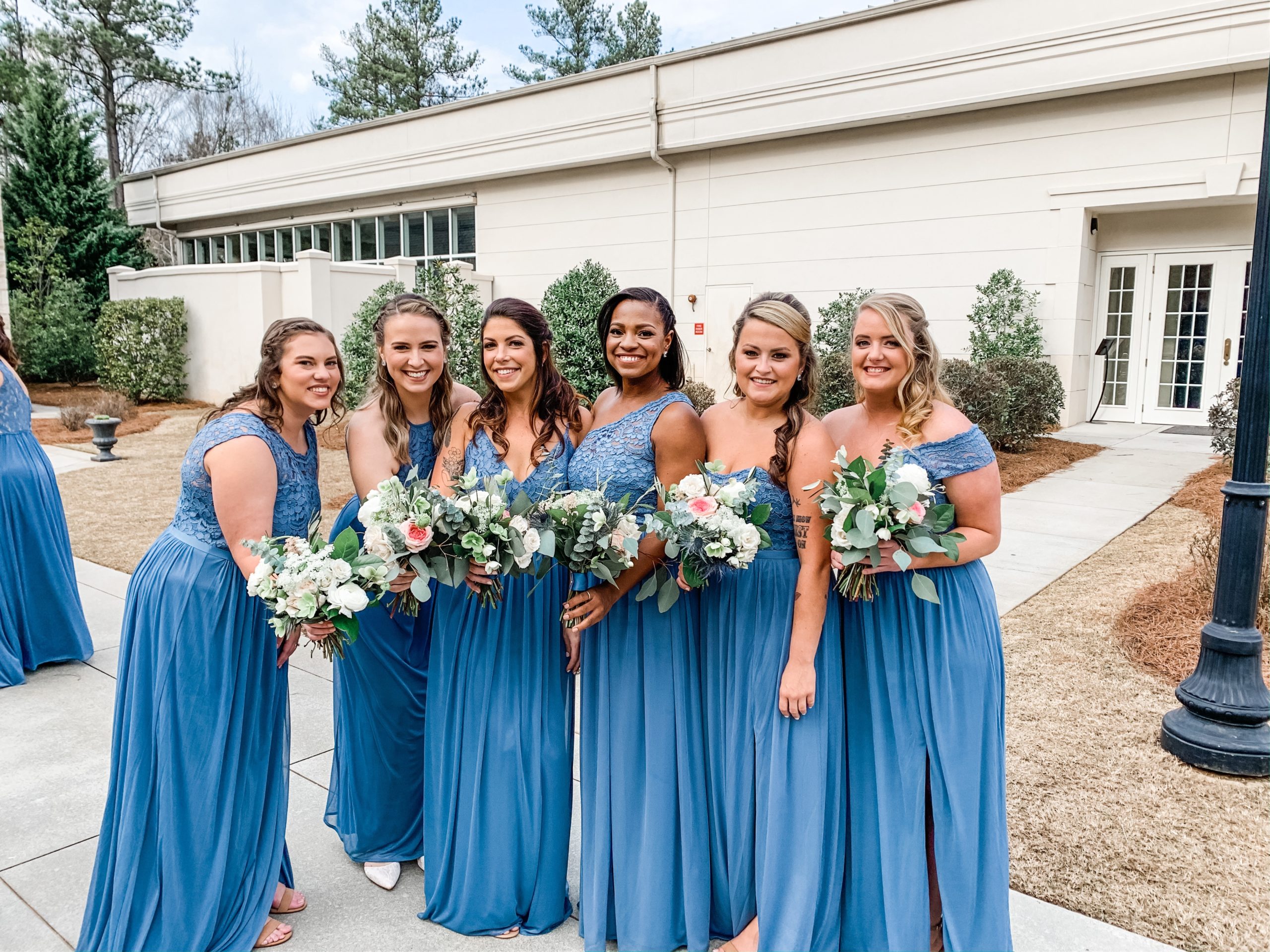 Ashton Gardens Atlanta- half of the bridesmaids with their bridal bouquets