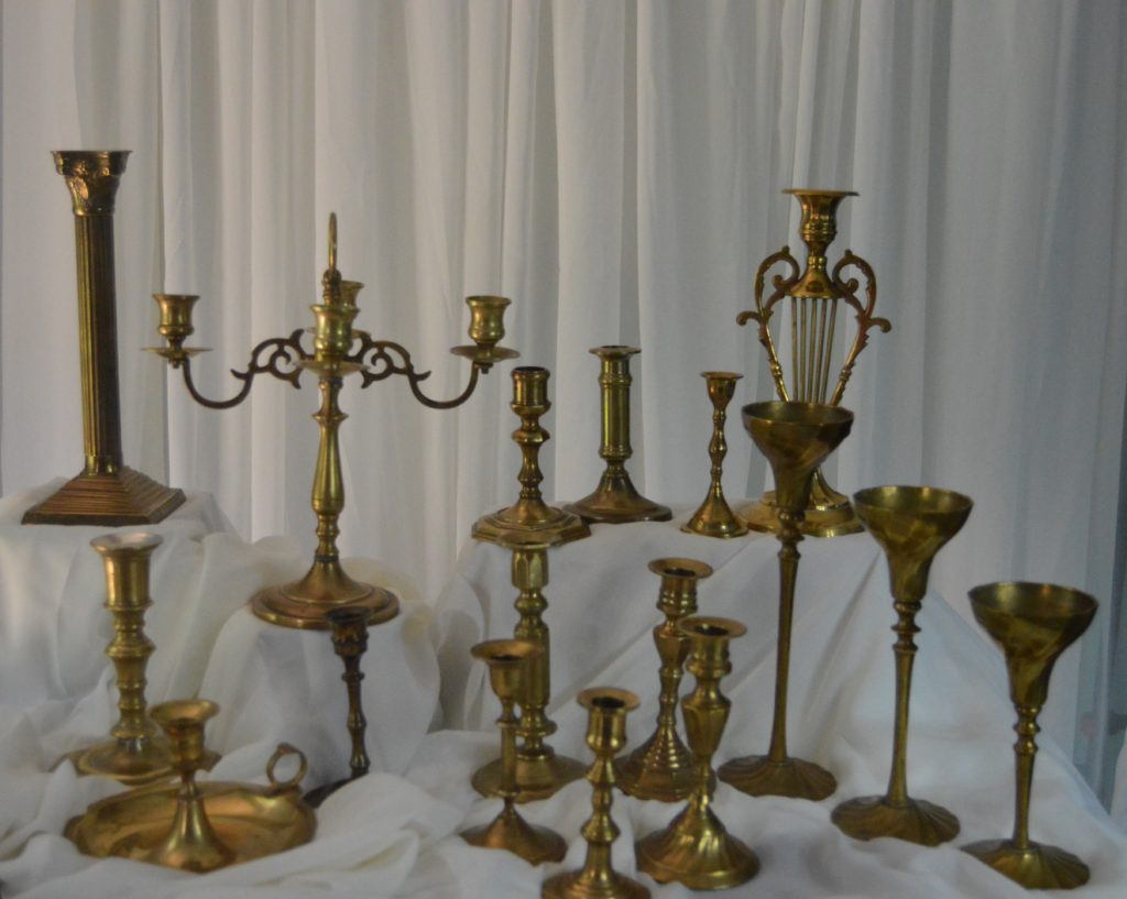 Brass tapered candle sticks wedding rentals