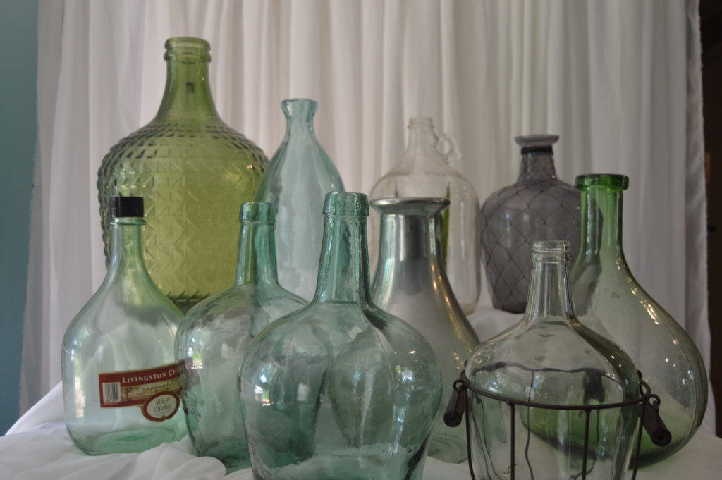 Vintage wine bottles wedding rental