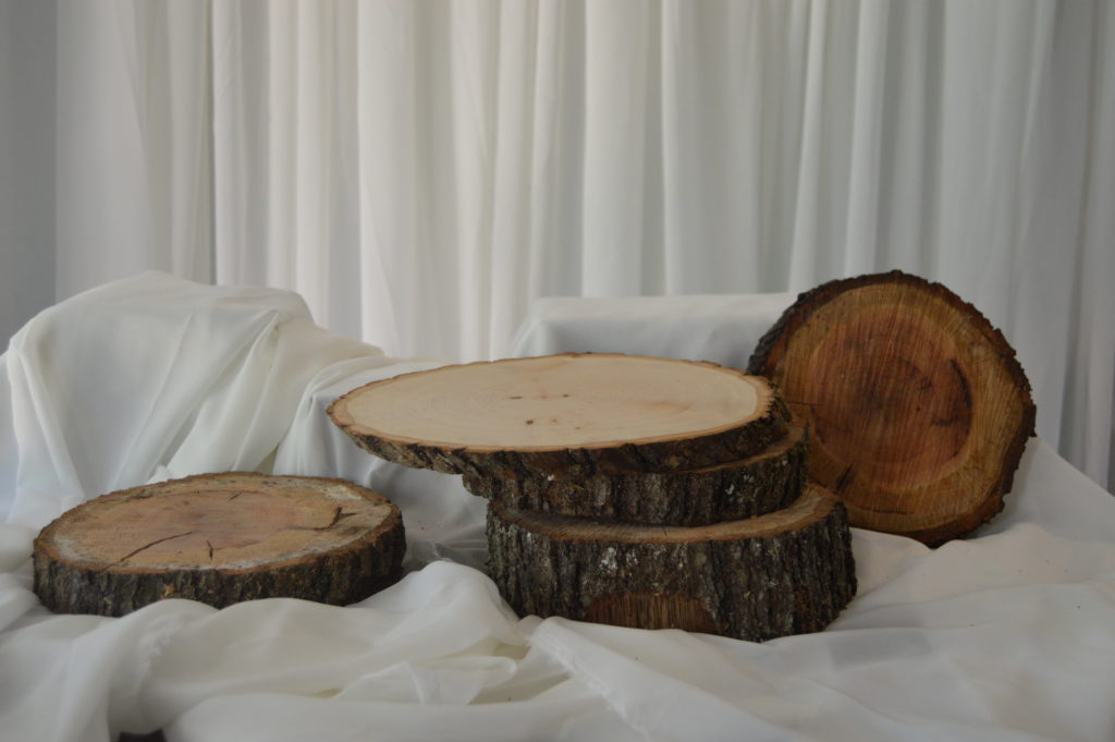 Rustic wood slice wedding rental