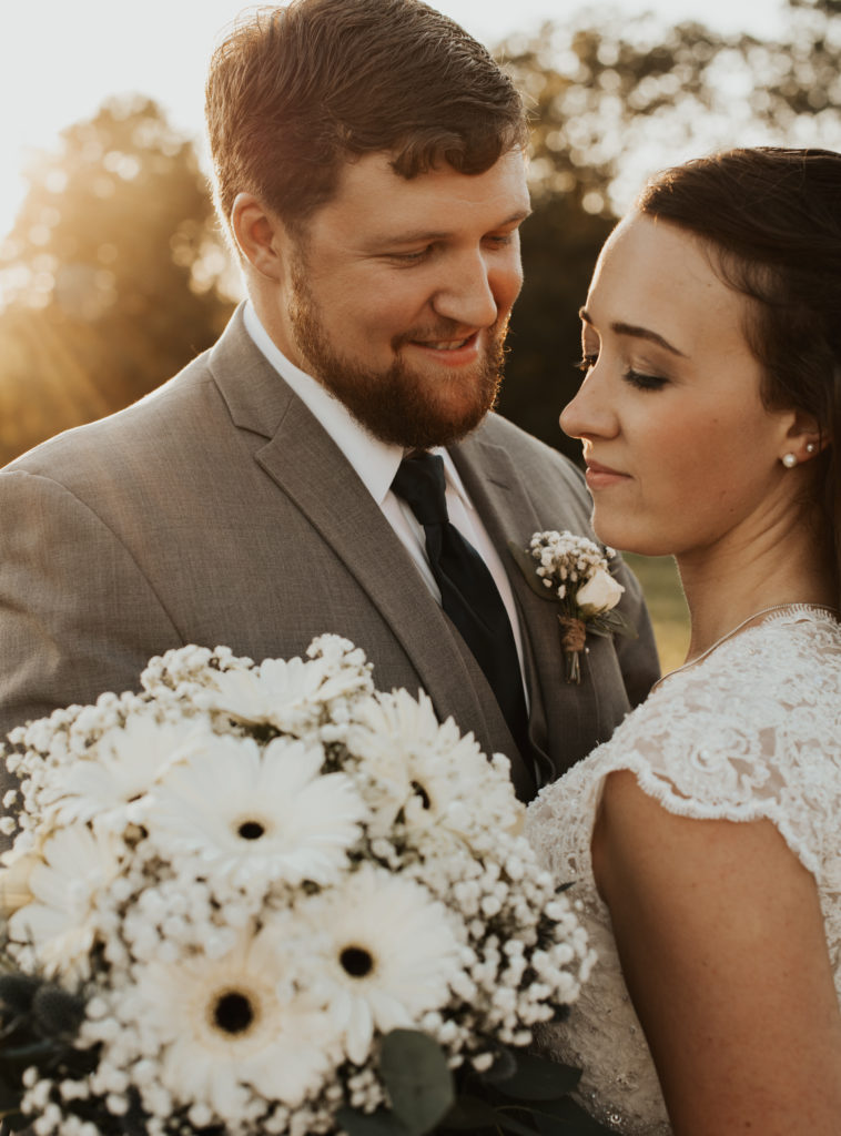 couple and bridal bouquet baby's breath wedding 