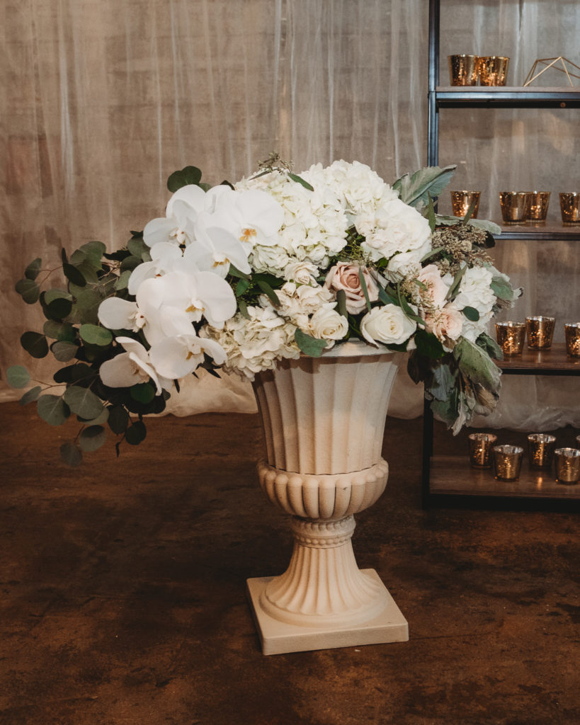 Flowers for the altar in an urn 